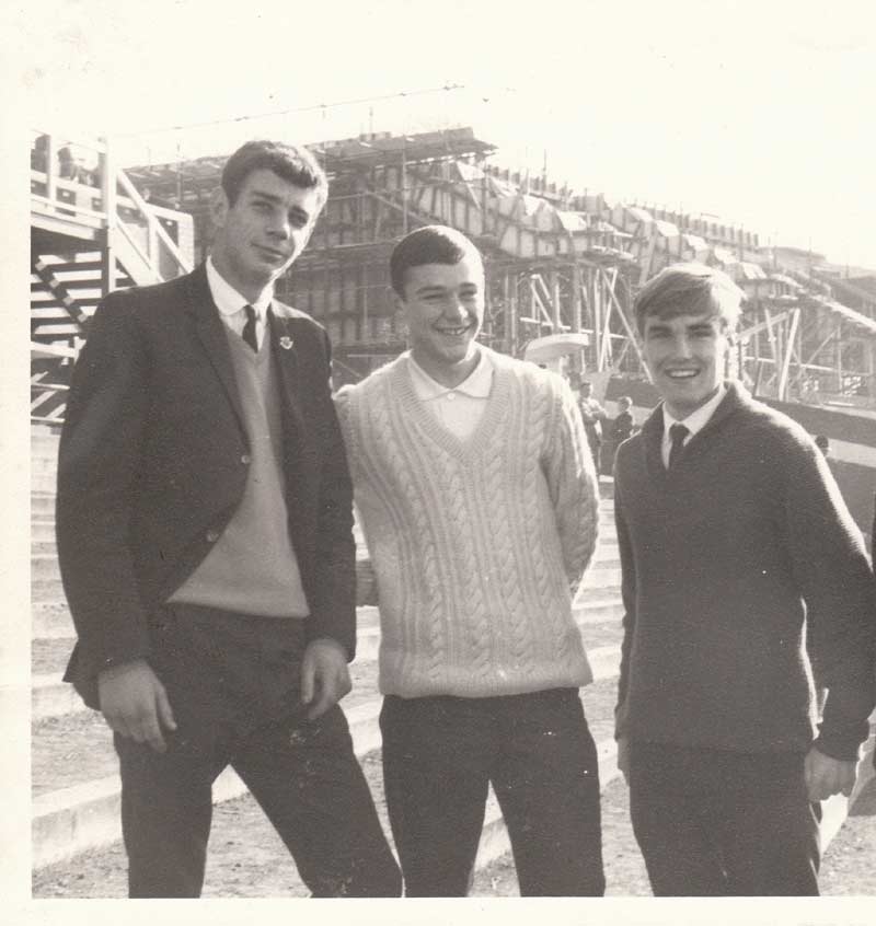 Standing on the terrace at the Carlton Football Ground with a view of the Carlton Social Club under construction.  Derrin Skidmore, Maurice Gale & Kerin Lawson.